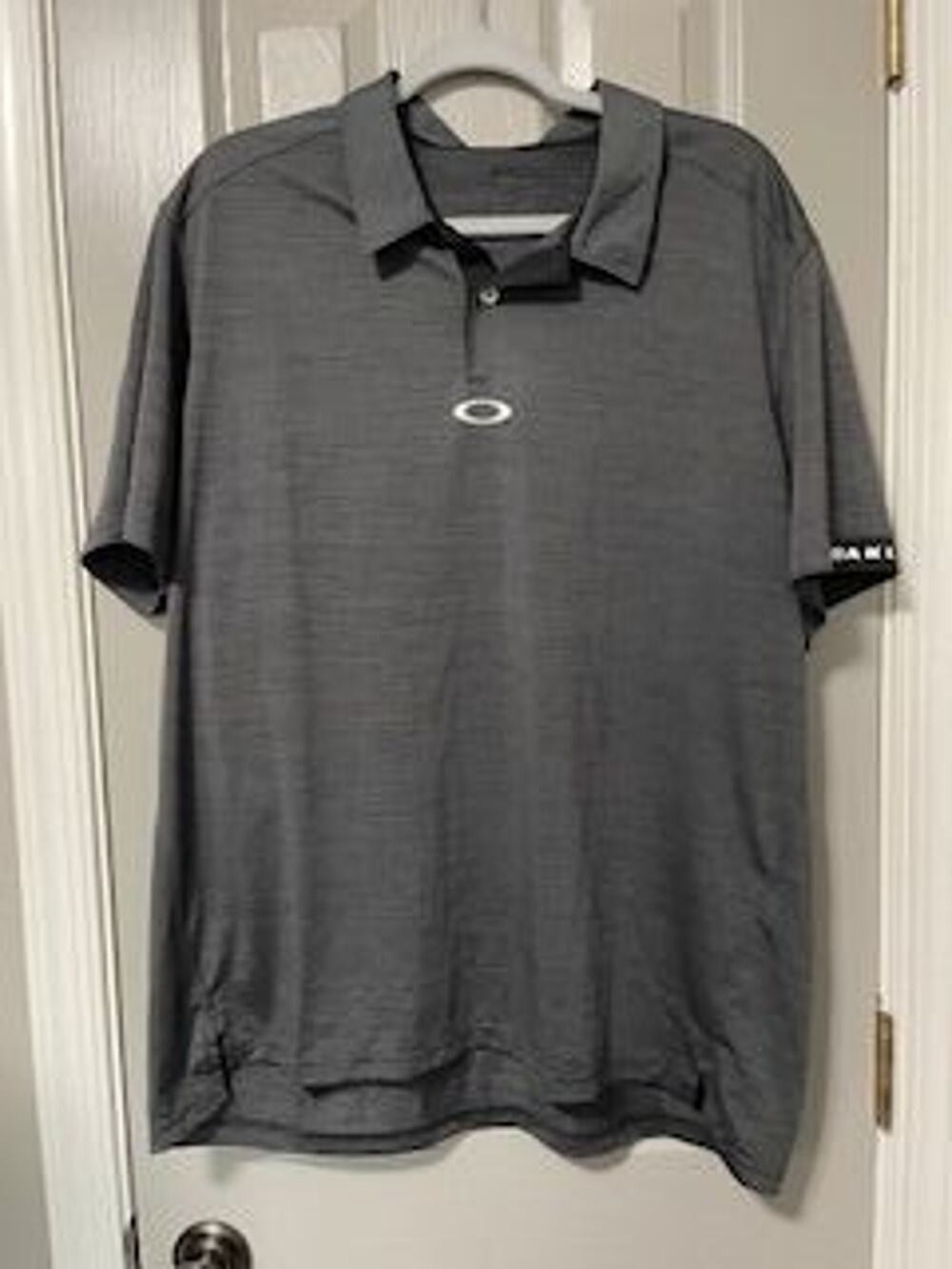 #T344 MENS - PRE-LOVED Oakley golf performance polo size XXL